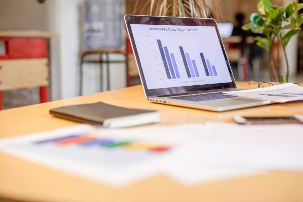 istock Laptop placed on the table next to the notebook and other office stuff. 939017838