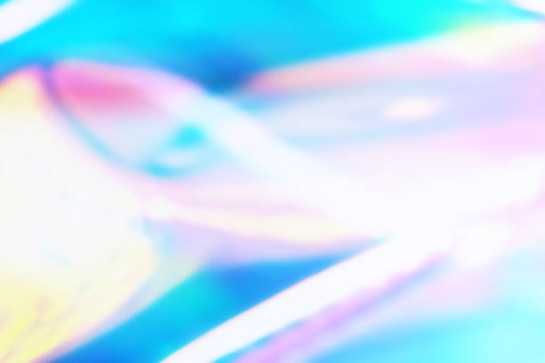 istock Colorful bright holographic background with light waves 939020316