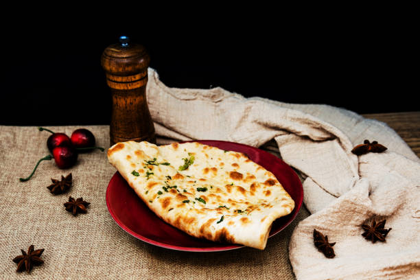 istock traditional Indian Naan garlic bread 939024104