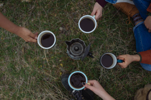 istock Hand pouring coffee with a moka pot 939026890