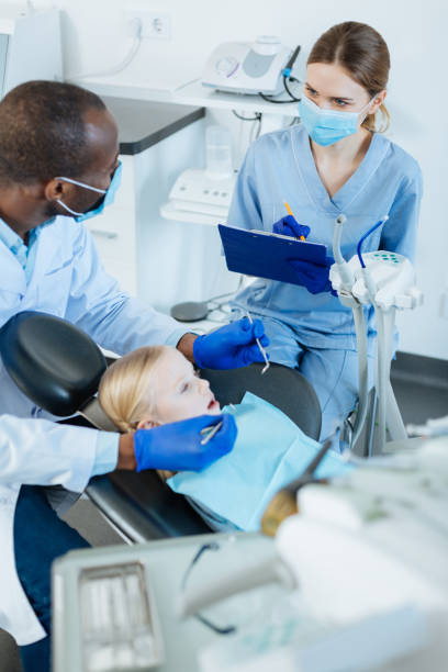 istock Pleasant nurse writing down dentists recommendations 939027944