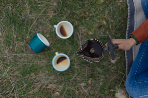 istock Hand pouring coffee with a moka pot 939027986
