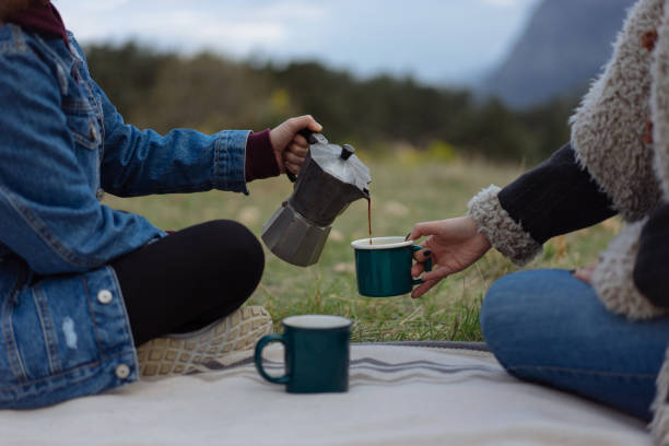 istock Hand pouring coffee with a moka pot 939028838