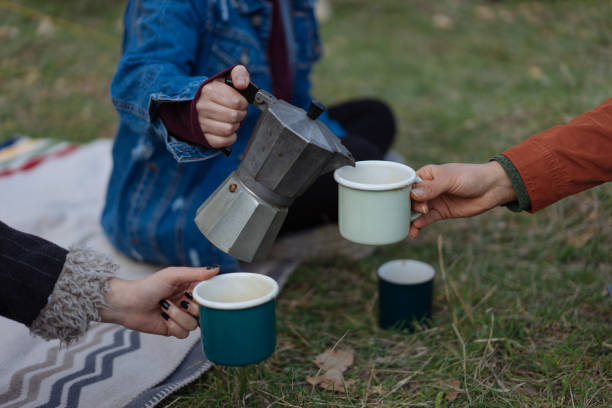 istock Hand pouring coffee with a moka pot 939030582