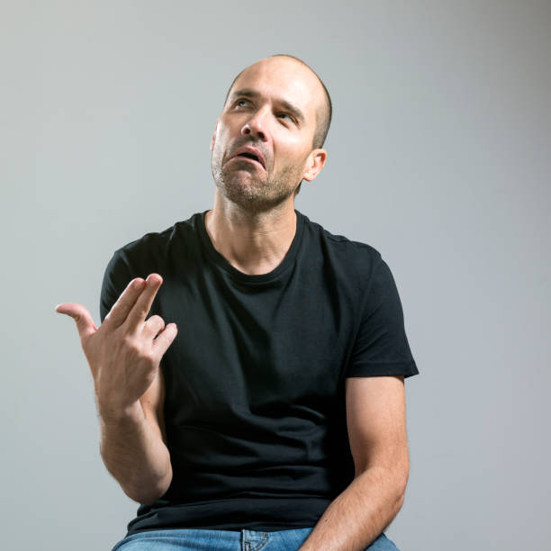 istock Man with a thoughtful face and ironic 939034656