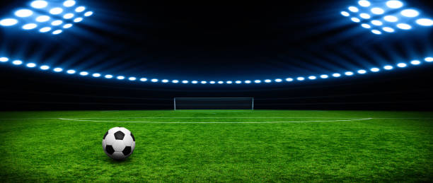 istock Soccer ball on stadium 939035632