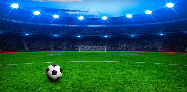 istock Soccer ball on stadium 939035692