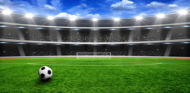 istock Soccer ball on stadium 939035736