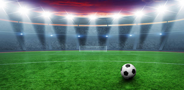 istock Soccer ball on stadium 939035742