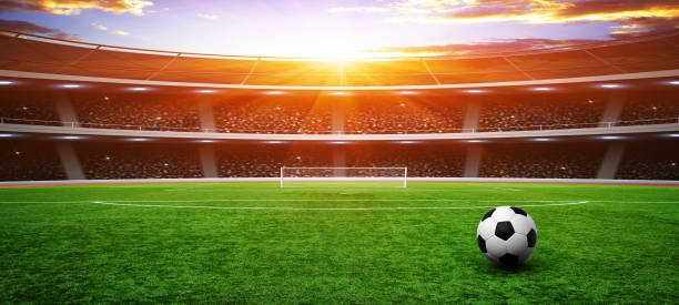 istock Soccer ball on stadium 939035770