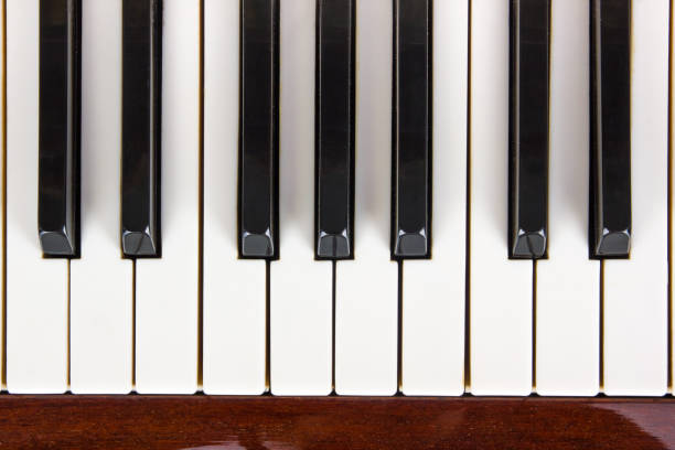 ピアノをクローズ アップ、ピアノの拍手します。バック グラウンド - piano piano key orchestra close up ストックフォトと画像