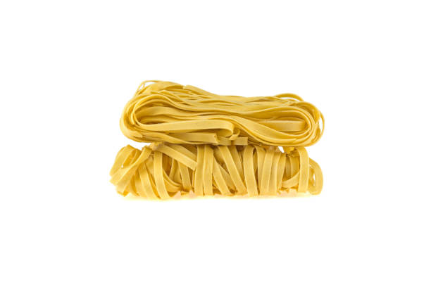 istock noodles, semi-finished product isolated on white background 939042558