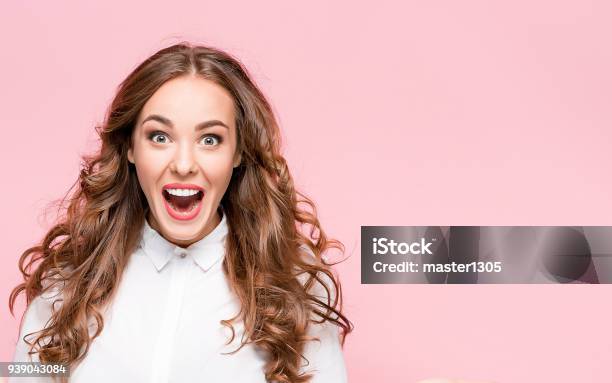 Surprised Happy Beautiful Woman Looking In Excitement Stock Photo - Download Image Now