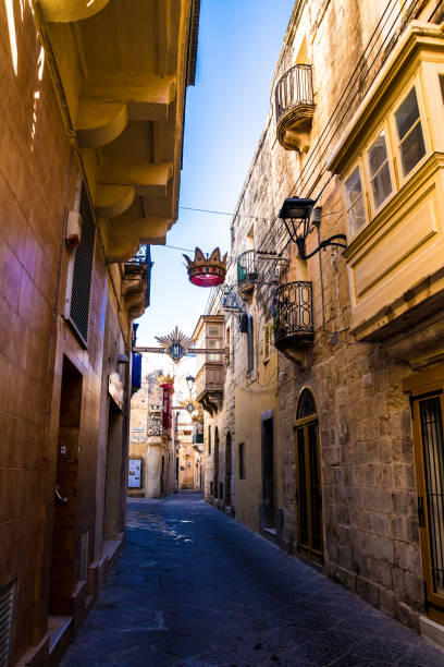 istock Ancient narrow streets in old town Mdina, Malta 939043218