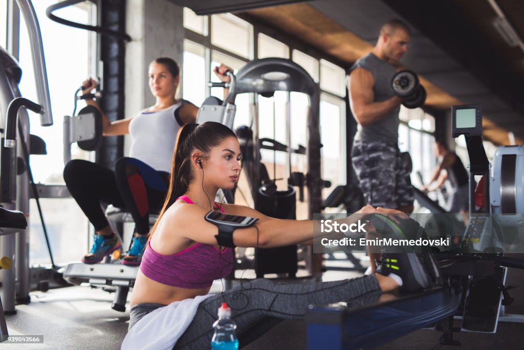 Woman Is Stretching Her Long Legs On The Fitness And Circuit Training Stock  Photo - Download Image Now - iStock