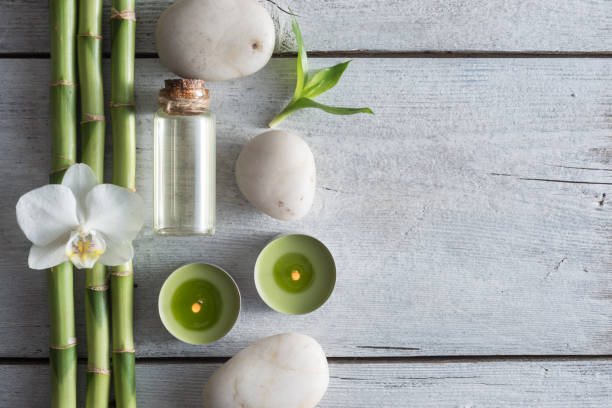 istock Top view of Spa composition with salt, bamboos and orchids 939048342