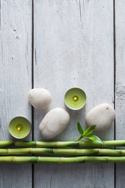 istock Top view of Spa composition with salt, bamboos and stone 939048410