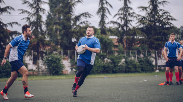 istock Rugby players exercising 939051570