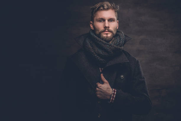 istock A man in a jacket and scarf. 939052140