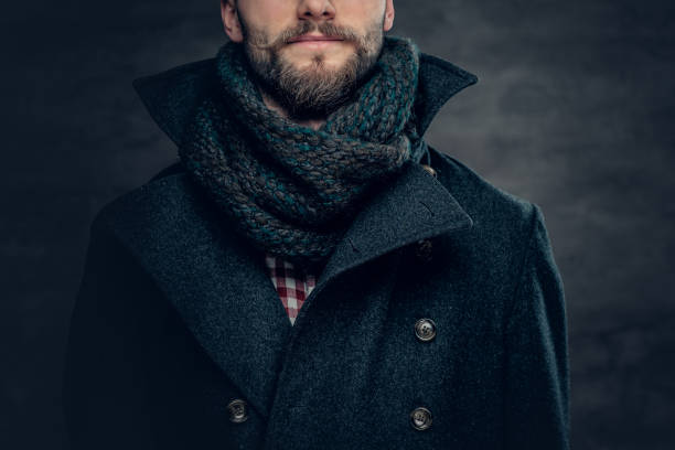 istock A man in a jacket and scarf. 939055470