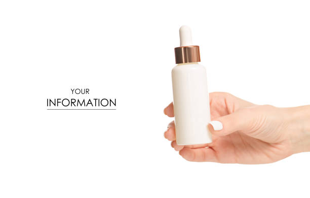 istock Bottle with cosmetics serum hyaluronic acid in hand pattern 939055810