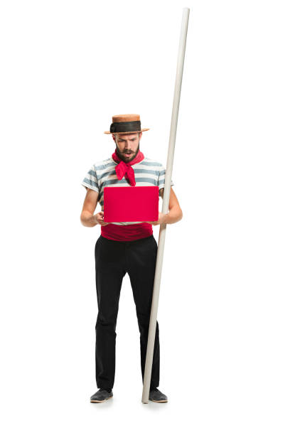 istock Caucasian man in traditional gondolier costume and hat 939058224