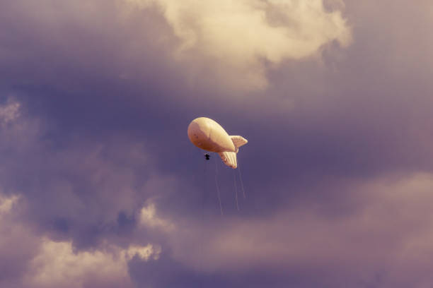 istock Military Aerostat in a beautiful sky with dramatic clouds 939061598