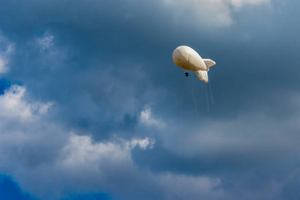 istock Military Aerostat in a beautiful sky with dramatic clouds 939061682