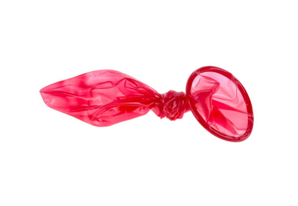 istock condom used knotted on knot isolated on white background 939061764
