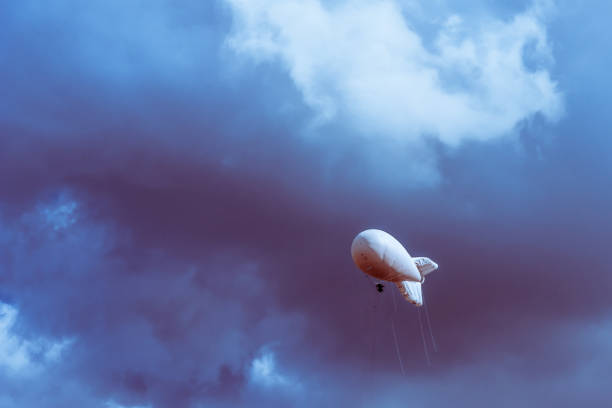 istock Military Aerostat in a beautiful sky with dramatic clouds 939061806