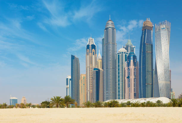 istock Dubai - The Marina towers from beach. 939070320