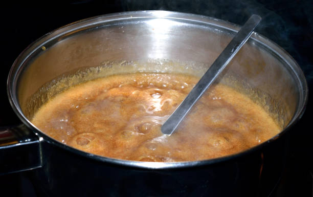 istock Boiling Old Fashioned Brown Sugar Fudge Close Up Abstract 939080640