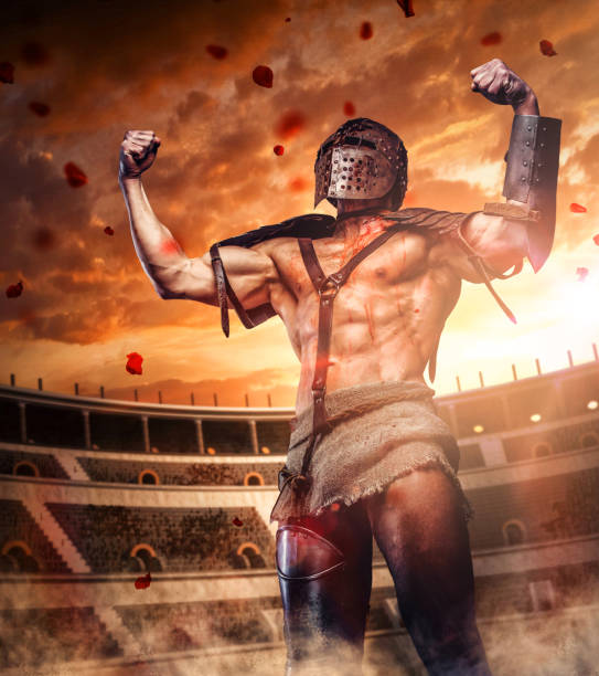 Brutal gladiator on coliseum victory field. stock photo