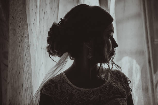 istock portrait of a young bride on a light background 939085796