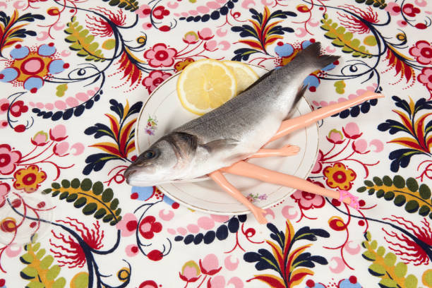 istock fish flower plate cannibal doll 939099378