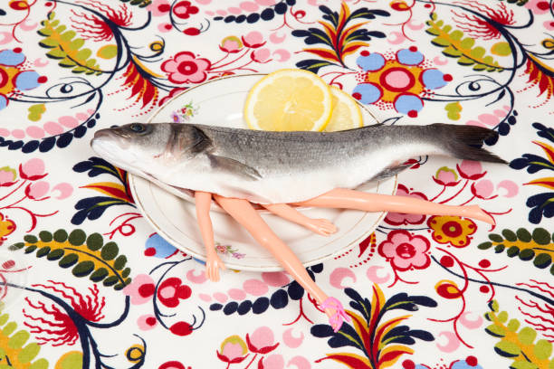 istock fish flower plate cannibal doll 939099386