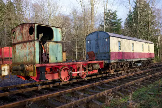 Train carriage abandoned on old railway disued steam engine