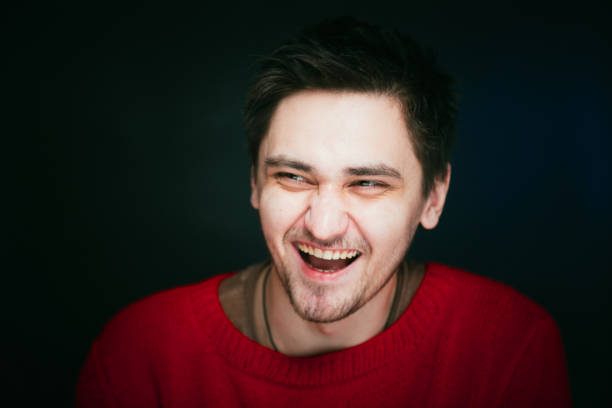 istock emotional young man photo in studio 939108142