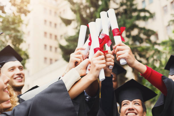istock A group of graduates celebrating 939108654
