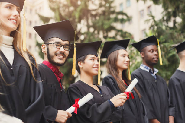 istock A group of graduates celebrating 939108774
