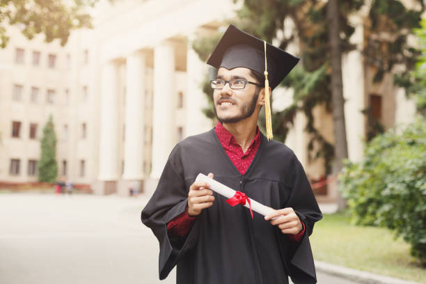 istock Happy young man on his graduation day. 939111500
