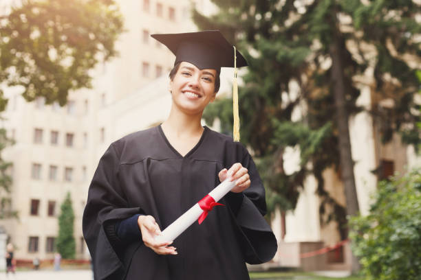 istock Happy young woman on her graduation day. 939111542