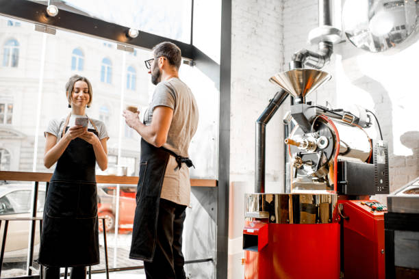 istock Baristas talking in the coffee shop 939112190