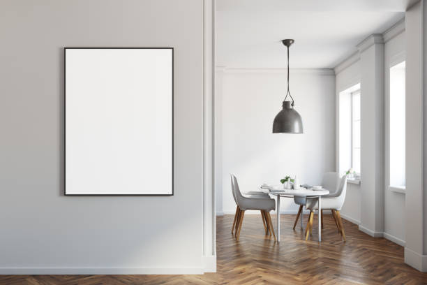 istock White dining room, wooden floor, poster on wall 939116864