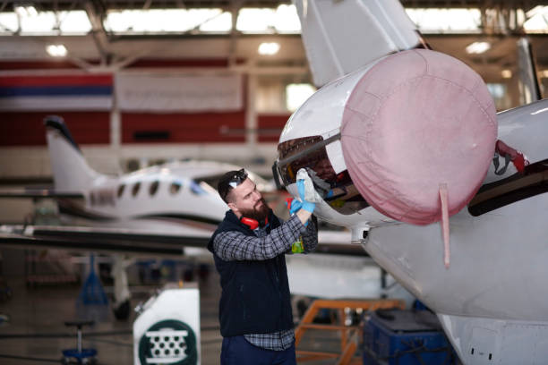 istock Aircraft mechanic in the hangar 939118474