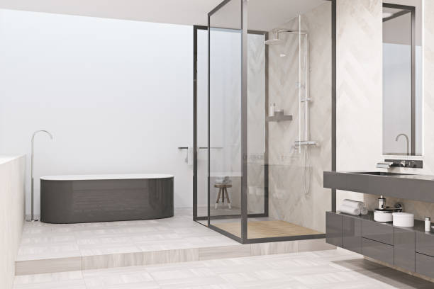 istock Modern bathroom corner with a gray tub 939124790