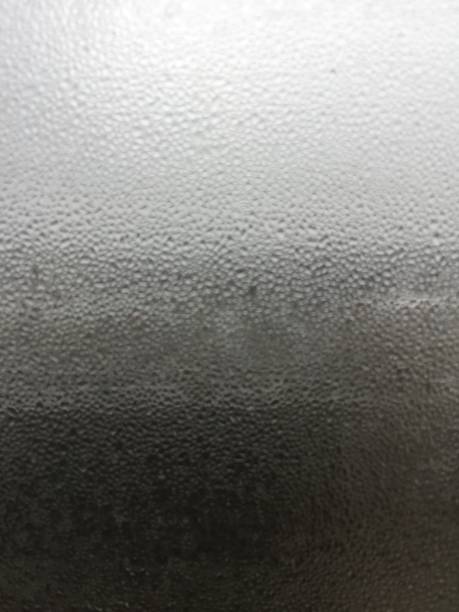 istock Tons of water droplets on window on rainy day 939126670