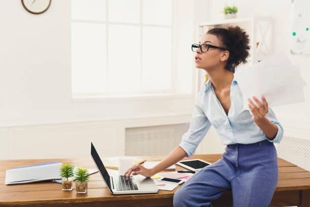 istock Shocked business woman at office 939128932