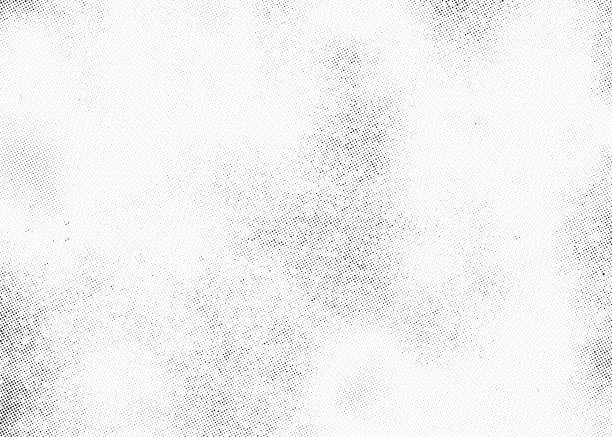 Subtle halftone dots vector texture overlay Subtle halftone vector texture overlay. Monochrome abstract splattered background. distraught stock illustrations
