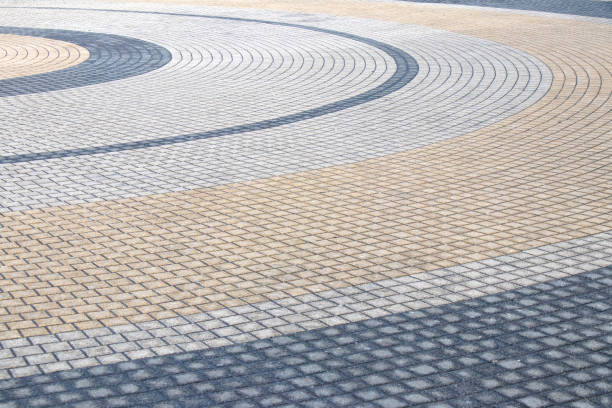 istock Area of concentric cobblestone circils in city centre 939133960